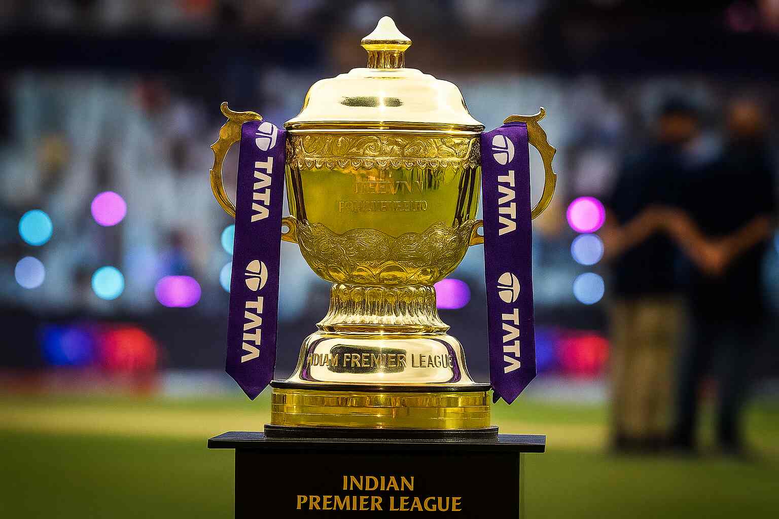 IPL cricket stadium crowd with players on field under bright floodlights symbolizing financial slowdown.