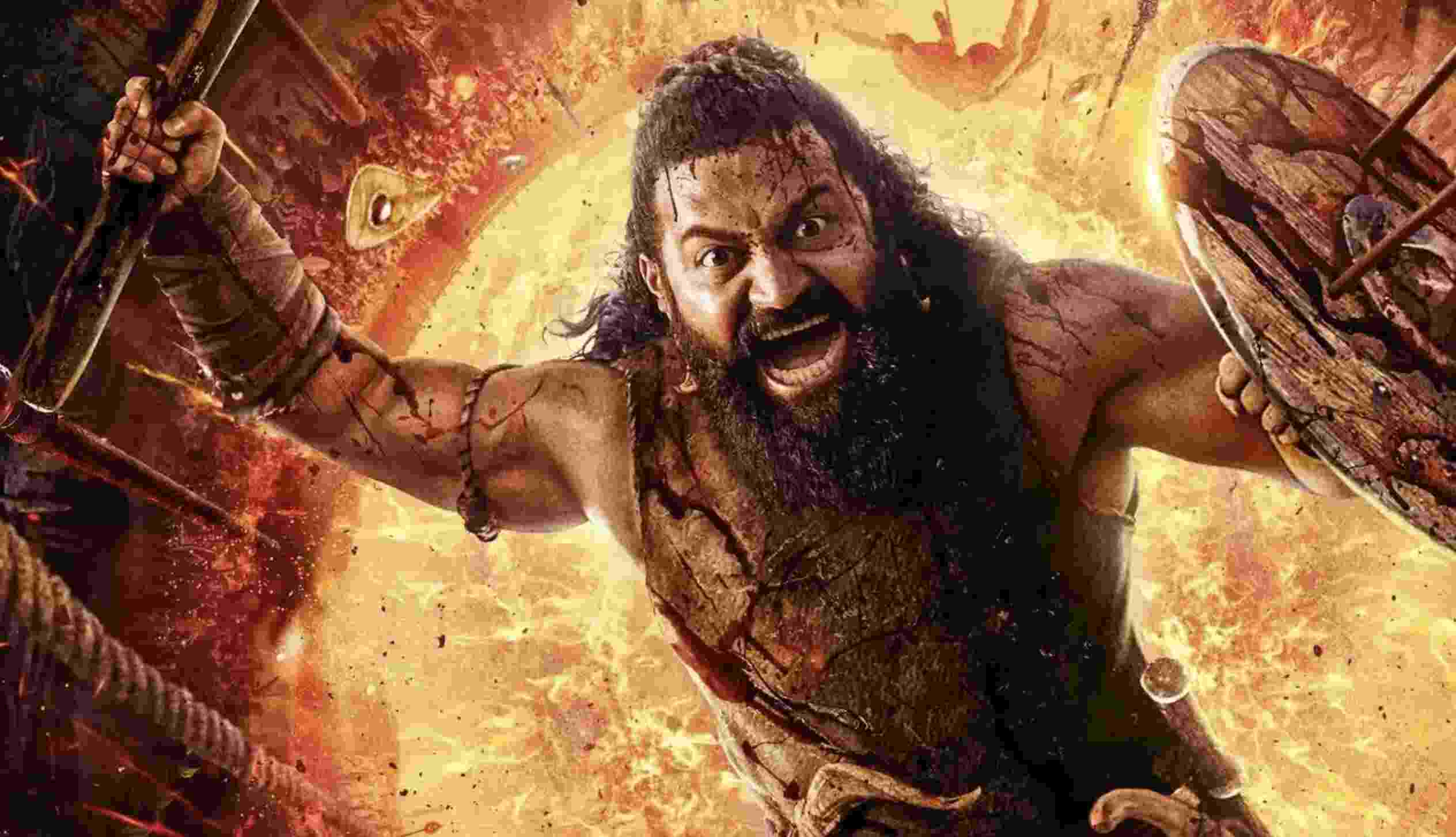 Rishab Shetty in a powerful scene from Kantara Chapter 1 with divine backdrop