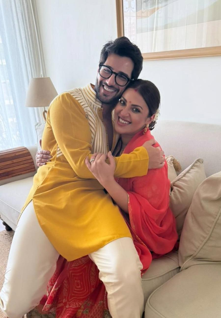 Parents to be Aditya Seal & Anushka Ranjan are all smile during a traditional Godhbharai