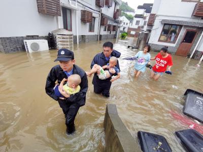 Over 95,000 evacuated as heavy rains hit Beijing